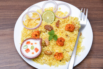 Biryani with shrimp Fish Biryani. Tasty and delicious prawns biryani, top view in traditional clay pot.