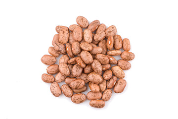 Pile of pinto beans isolated on white background