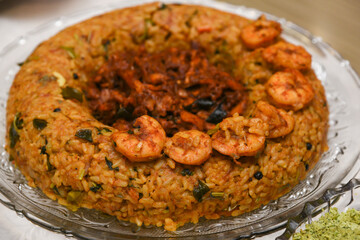 Biryani with shrimp Fish Biryani. Tasty and delicious prawns biryani, top view in traditional clay pot.