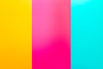 Colored paper lying on top of table. Pink, blue, yellow thick paper. background.