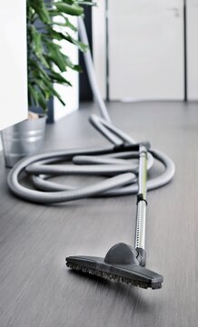 Central vacuum cleaner hose in living room
