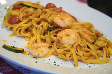 Delicious homemade Italian pasta with shrimps and parmesan cheese