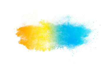 Colored powder explosion. Abstract closeup dust on backdrop. Colorful explode. Paint holi.