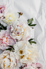 Pink and white peonies.