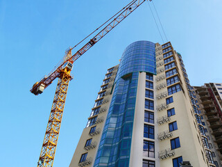 Construction site. Building site with crane. Concrete building under construction
