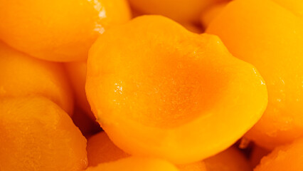 Peaches, sliced ​​in half, appetizing yellow.
