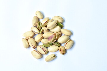 baked salty pistachio nut arranging on white background