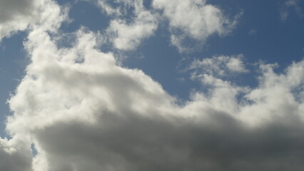 white clouds in a blue sky