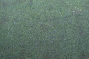 Old painted wall with cracked paint