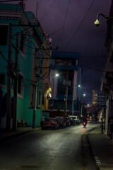 Fototapeta premium Deserted street at night in the city centre, Santiago de Cuba, Cuba