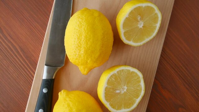 Lemon on the kitchen board. Seamless. Loop. looping.