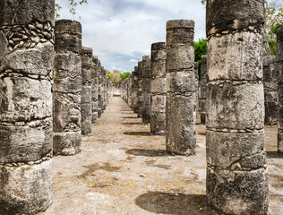 Fototapeta na wymiar Thousand columns structure: Mayan ruins featuring carved pillars at Chichen Itza archaeological site.