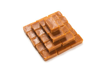 Tasty caramel candy isolated on white background.