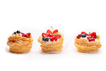 Home made cake with cream and fruits isolated.