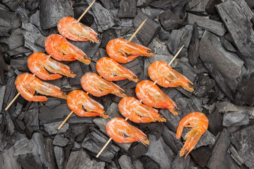 Grilled food. Charcoal skewers shrimps. Grilled food.