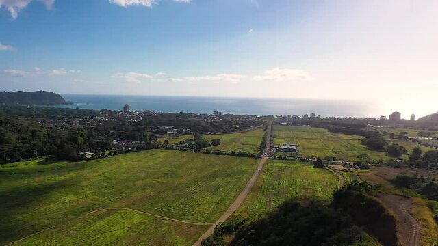 Flying towards the city of Jaco and Pacific Ocean in Costa Rica
