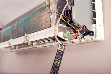 A dirty air conditioning full of dust before cleaning