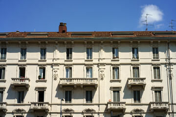 Fototapeta na wymiar Old residential palace along corso Sempione in Milan, Italy
