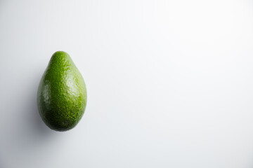 Avocado on a white background. Minimum concept