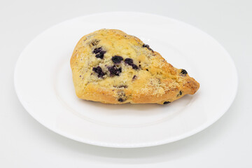 Simple Blueberry Scone on a White Plate with a White Background