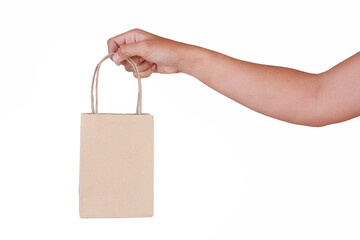 Hand Holding Paper Bag isolated on White Background.