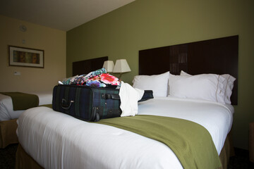 General Luxury hotel room with suitcase . Just arrived.