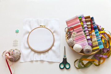 Accessories for embroidery with satin ribbons: hoop, needles with big eyelet, pins, scissors and...