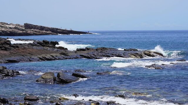 Blue sea with rocks and waves of coastline. New Taipei City, Taiwan.