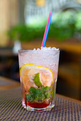 Refreshing mojito with crushed ice on a hot summer day