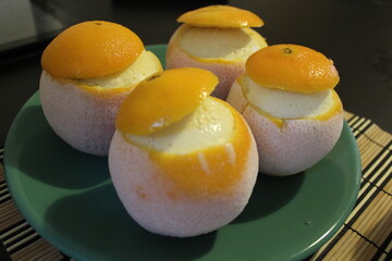 delicious orange ice cream inside the orange