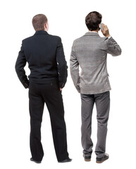 Back view of  two business man in suit with mobile phone.