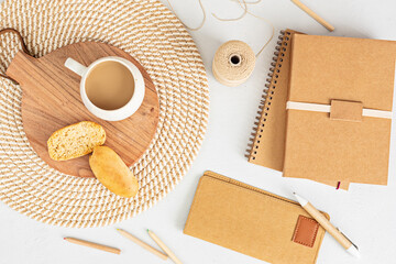 Fototapeta na wymiar Styled minimal desktop mockup with organic color stationary, coffee cup. Freelancer, social media blogger concept. Flat lay, top view