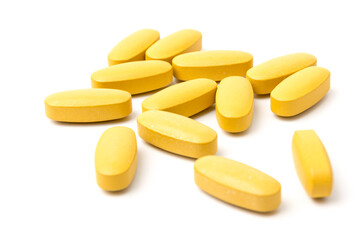 Multivitamin and mutimineral pills, nutritional Supplement on white background in close-up