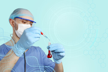 male doctor in a blue uniform with a stethoscope in a protective mask and glasses is conducting a...