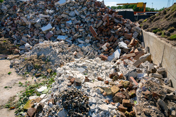 Loads of rubble at a landfill on a sunny summer day