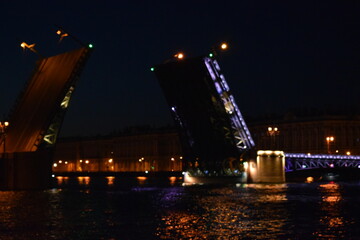 Fototapeta na wymiar night view of the bridge over the river