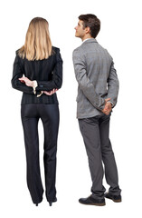 Back view of business woman and business man in suit.