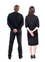 Back view of business woman and business man in suit.