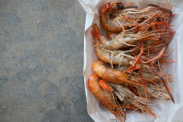 Grilled shrimp in foam box package. Thai cuisine seafood.