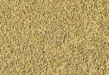 Yellow base of the playground from the calibrated crushed stone
