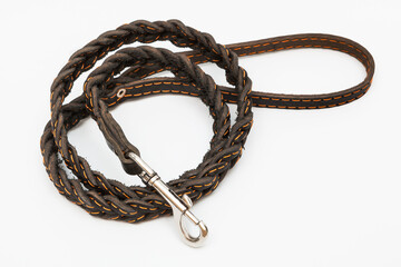 brown leather leash on white background