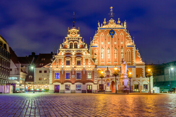 Obraz premium Sightseeing of Latvia. City Hall Square in Riga Old Town. Beautiful night view