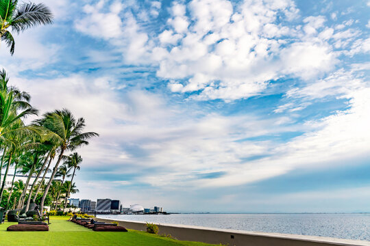Blue skies along the coast of Pasay over the Manila Bay in the Philippines.