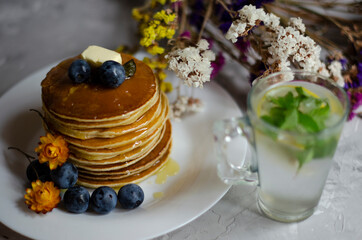 pancakes with honey and berries