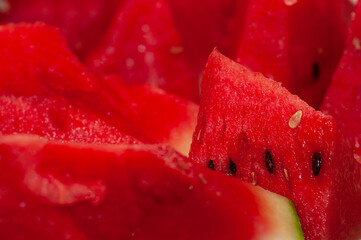 Chunks of the red watermelon with black pips seed