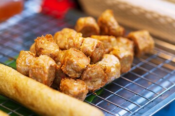 Close up of (Hoi Jo) Deep Fried Crab meat roll thai street food market