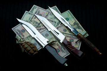 Bandit tools and loot - grenade, knives and money.