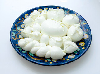 buffalo mozzarella cheese from the Campania region isolated on the white background
