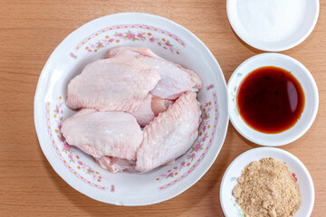 Raw Chicken With Ingredients For Cooking