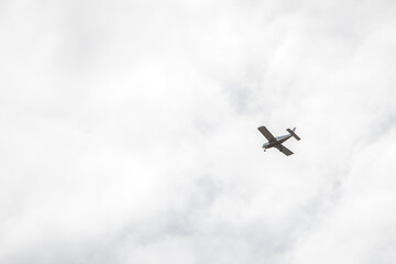 small airplane in sky